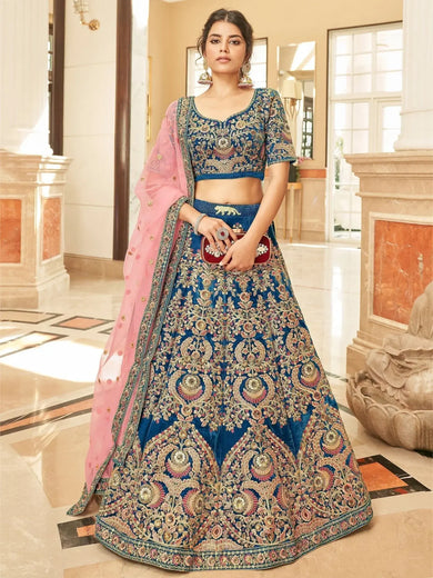 Attractive Blue Heavy Embroidery Velvet Wedding Wear Lehenga Choli - Ethnic Plus In